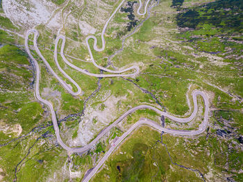 Winding road aerial view by drone. sibiu, romania. a great place to drive and stop during a trip.