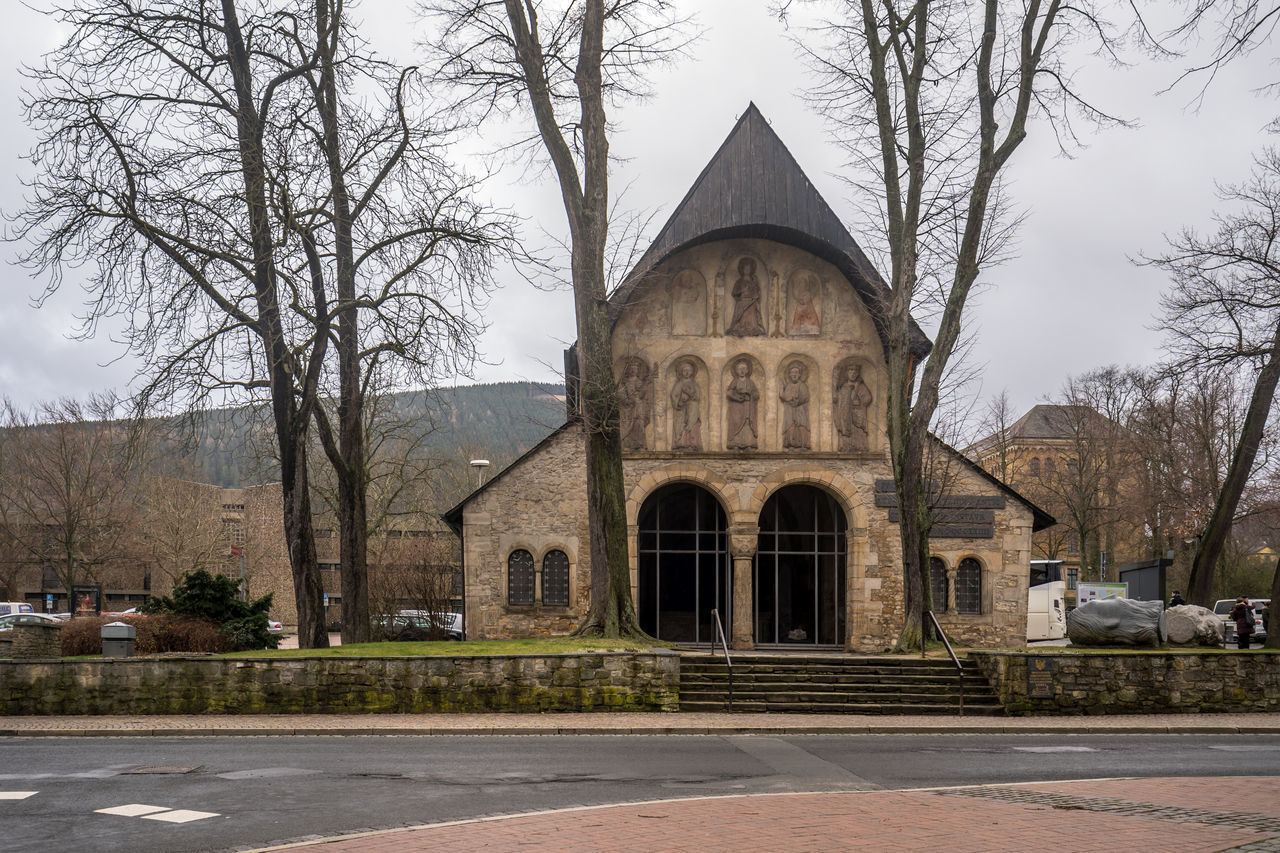 EXTERIOR OF HISTORIC BUILDING BY TREES