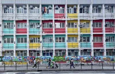 People in front of building