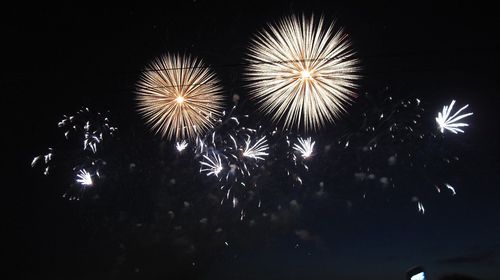 Low angle view of firework display