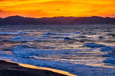 Scenic view of sea against sky during sunset