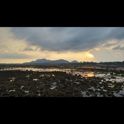 Scenic view of landscape at sunset
