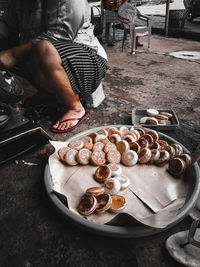 High angle view of man preparing food on table