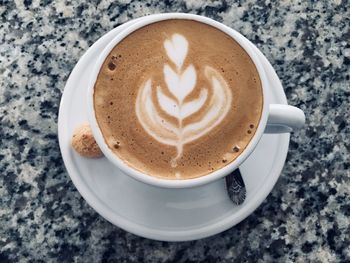 High angle view of cappuccino on table