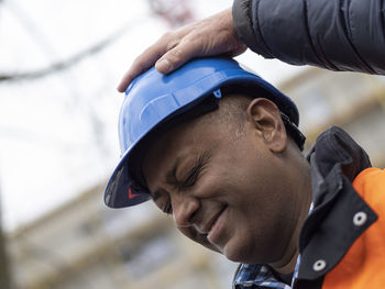 Side view of man working in factory