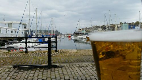 Close-up of harbor against sky