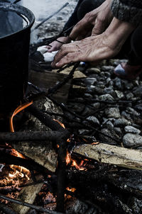 Close-up of preparing food on chulah