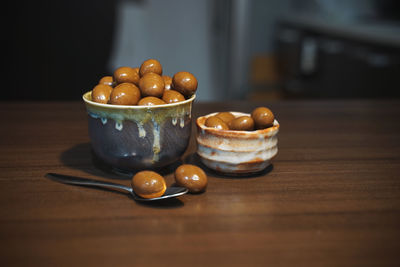 Close-up of fruits in bowl on table