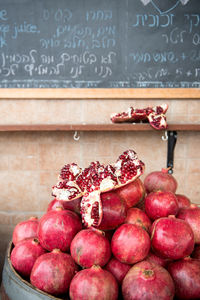 Fresh pomegranates adorn a hip cafe in tel aviv.