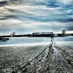 Scenic view of sea against sky during winter