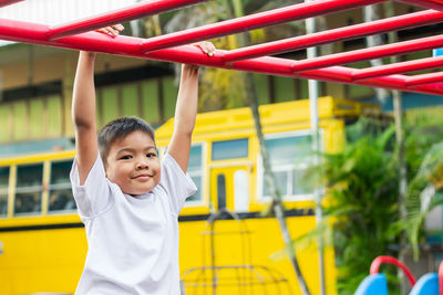 Cute boy smiling in playground