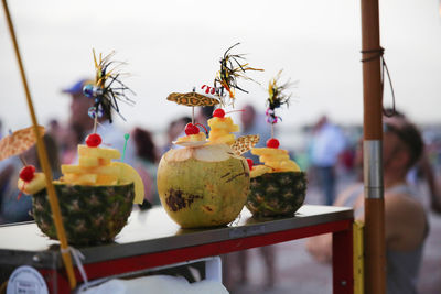 Close-up of food decoration at beach