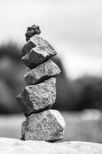 Close-up of stone stack on rock