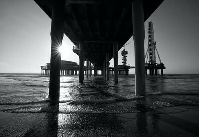 Pier over sea against sky