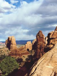 Scenic view of cliff against sky