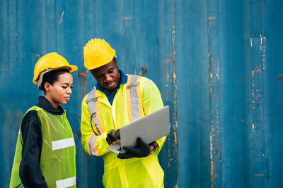 Man working with yellow umbrella