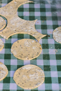 High angle view of flatbread dough on table