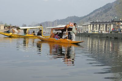 People in boat at sea