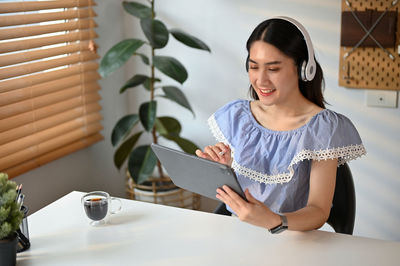 Young woman using mobile phone