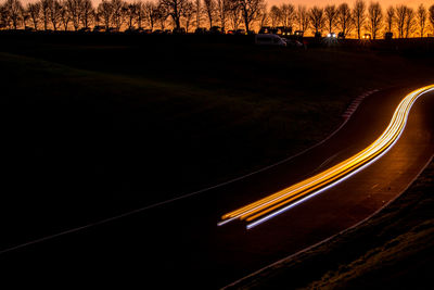 Light trails on road at night