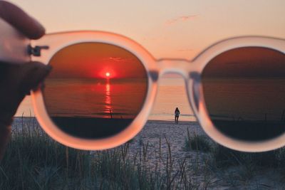 Silhouette of people at sunset