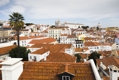 Cityscape view of the terracotta roofs of historic lisbon, portugal