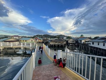 The houses on the seafront, precisely in batam, indonesia igh angle view of cityscape against sky