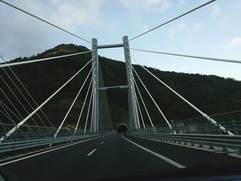 View of suspension bridge against sky