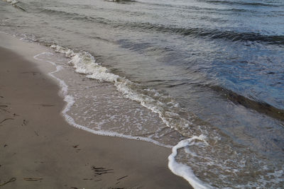 High angle view of surf on beach