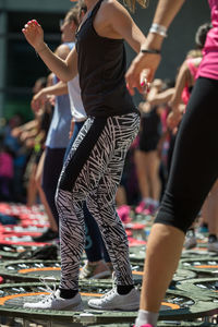 People exercising on trampolines outdoors