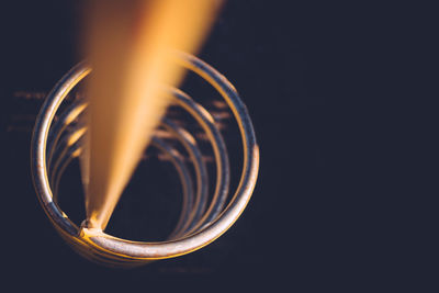 Close-up of spiral light at night