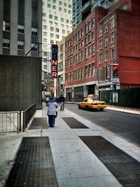Cars on street in city