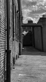 Narrow alley amidst buildings in city