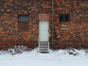 Closed door on building during winter