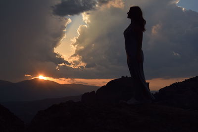 Silhouette of mountain against sky during sunset