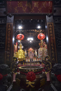 Illuminated statues in building