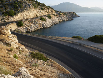 High angle view of road by sea against sky