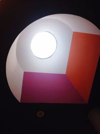 Low angle view of illuminated lamp
