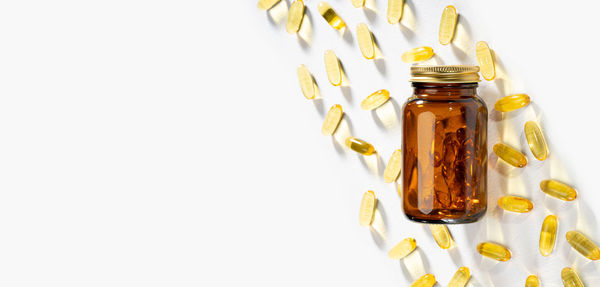 Close-up of medicines on white background