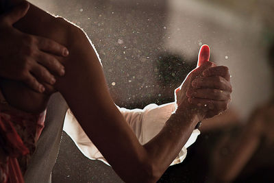 Close-up of couple dancing