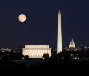 View of city lit up at night