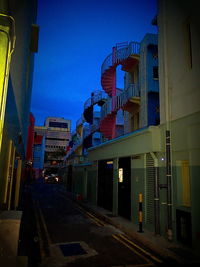 View of illuminated buildings in city