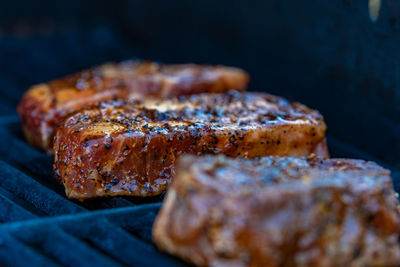 Close-up of meat on barbecue grill