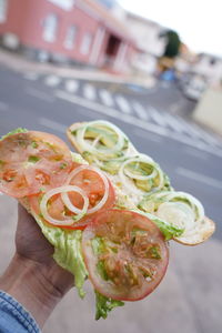 Close-up of hand holding food