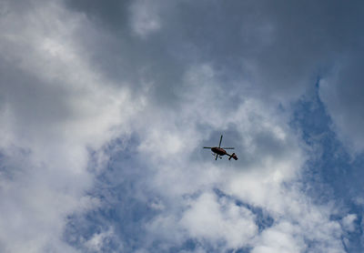 Low angle view of airplane in sky
