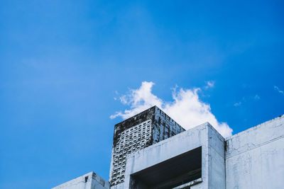 Low angle view of building against blue sky