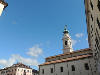 Low angle view of building against blue sky