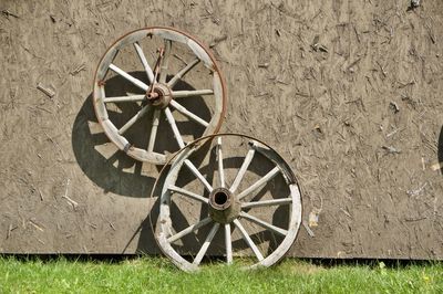 Abandoned wheel on field