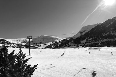 Scenic view of snow covered mountain against sky