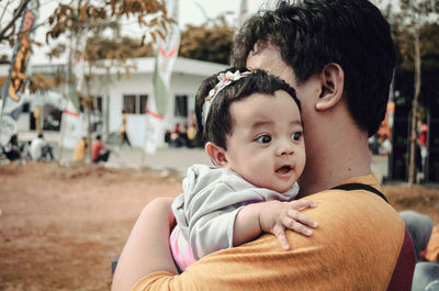 Portrait of father and daughter